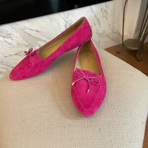 Talbot’s hot pink flats with bow.